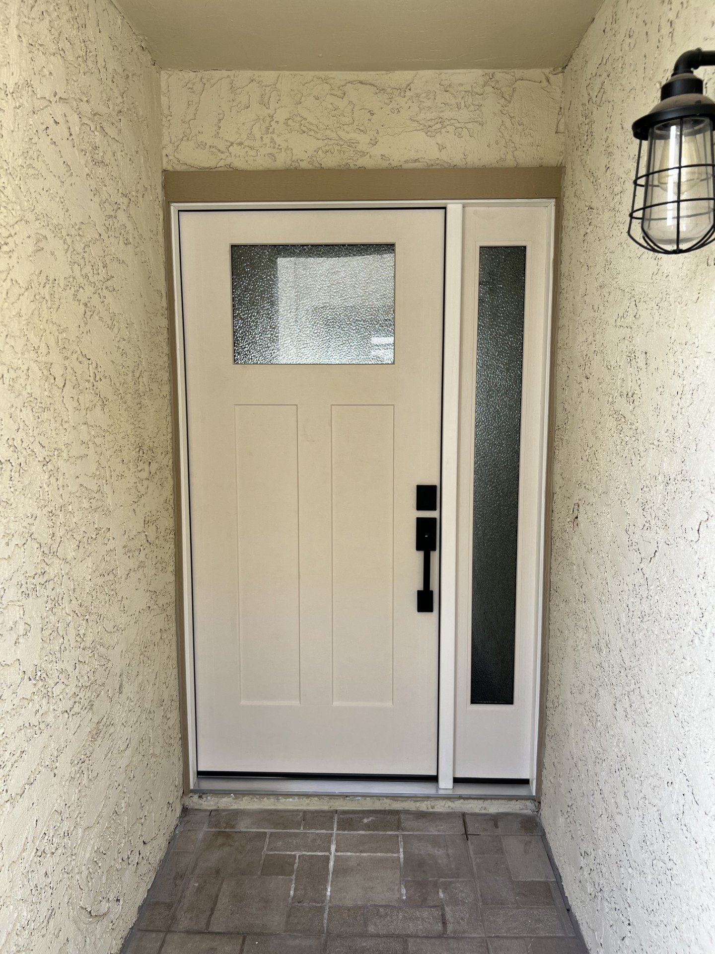 Installed exterior entry door
